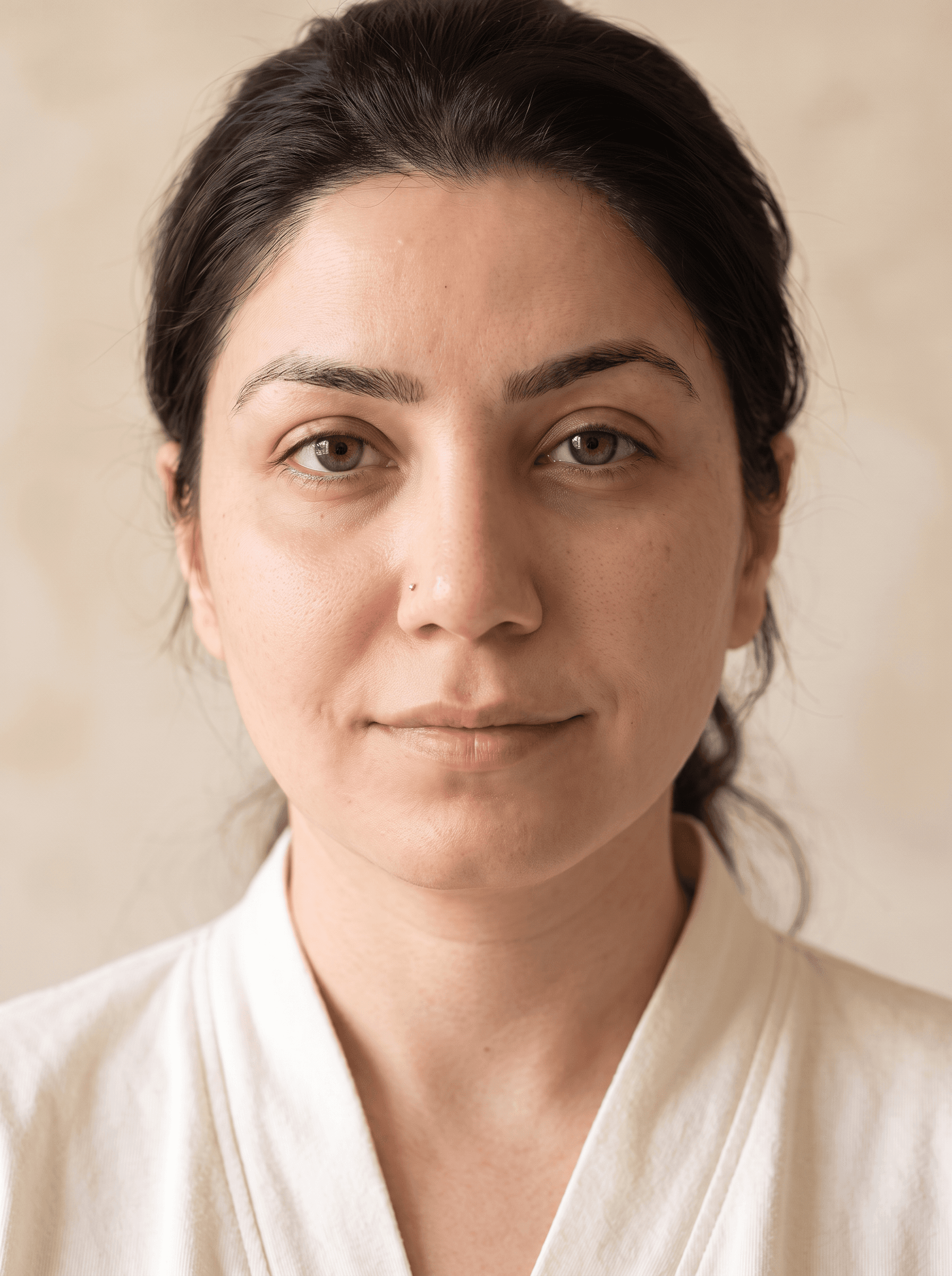 Aisha, AI-assisted bare-face beauty portrait in soft natural light